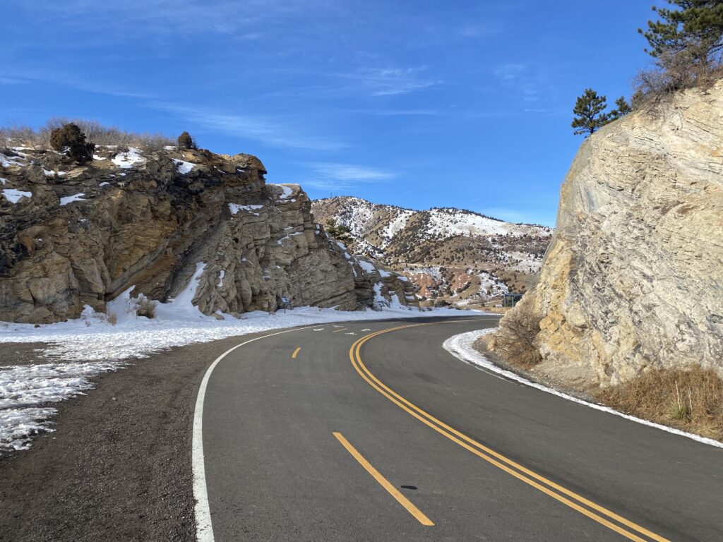 Melting snow by the roadside